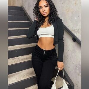 NEW boot cut pants never worn no back pockets cute pockets on the side.